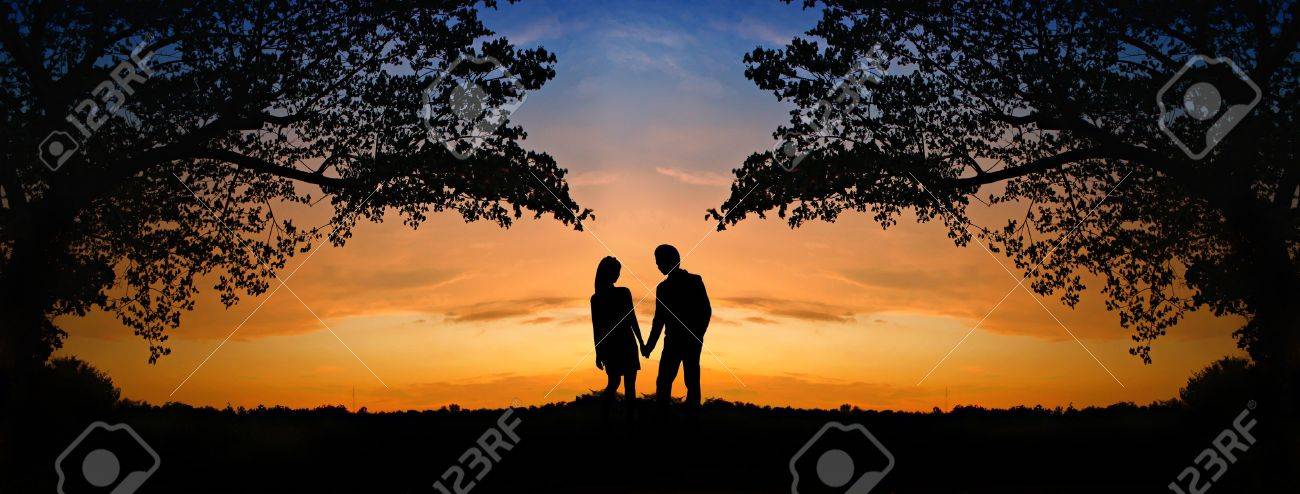 10532785-la-imagen-de-dos-personas-románticas-en-el-amor-de-pie-en-la-puesta-de-sol.jpg